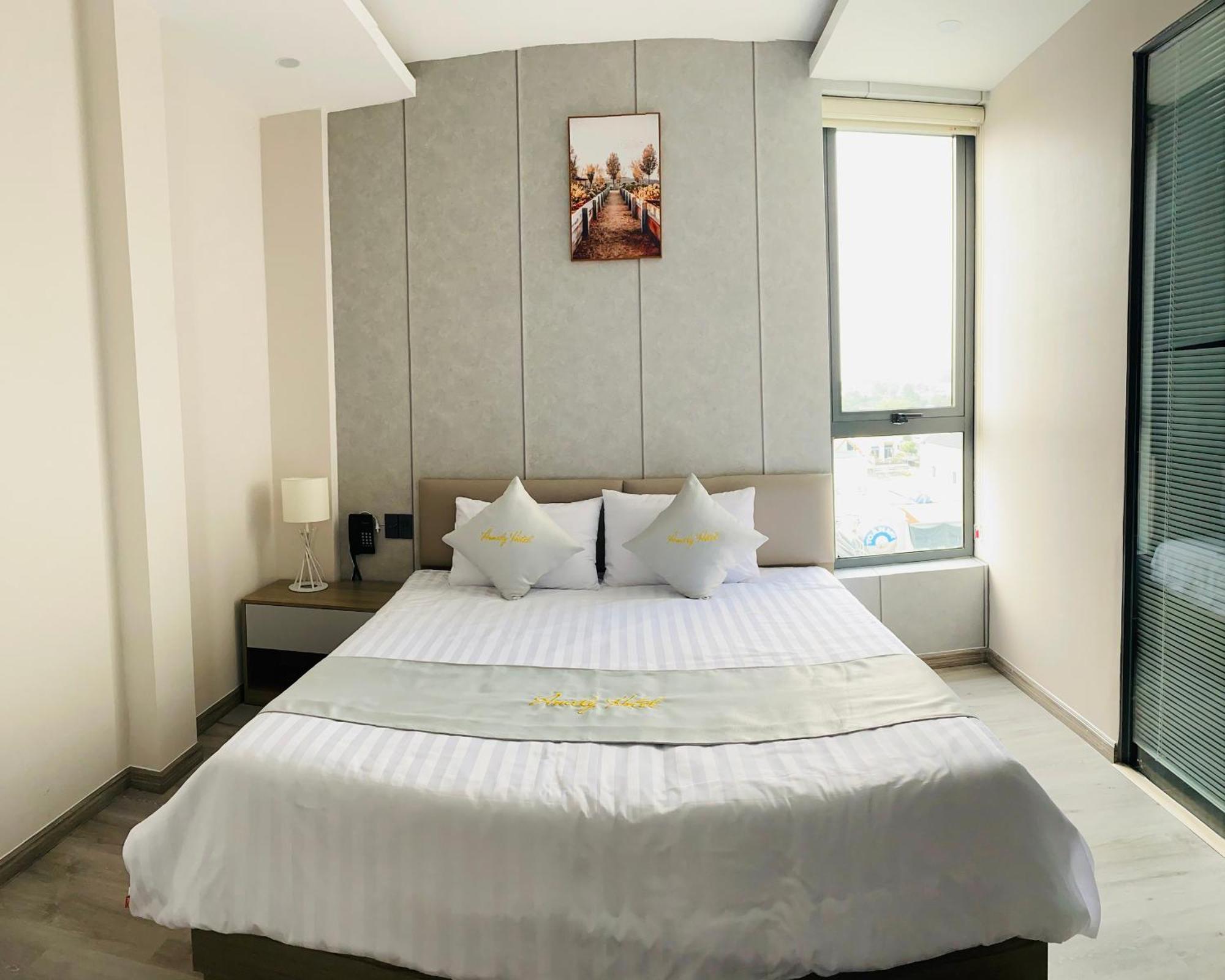 Amely Hotel Ben Cat Esterno foto